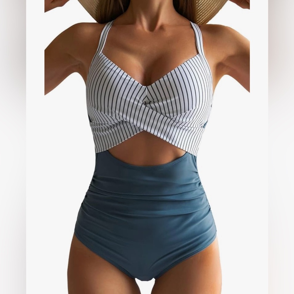One piece cutout  bathing suit size medium. Eomeanie.  Striped and solid teal